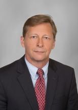 headshot of attorney David M. McQuiston